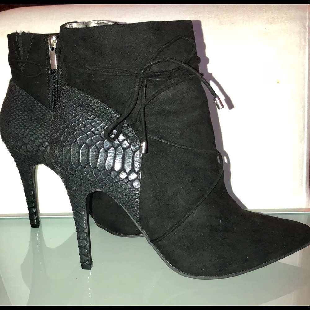 Black suede boots with faux snake skin heel.